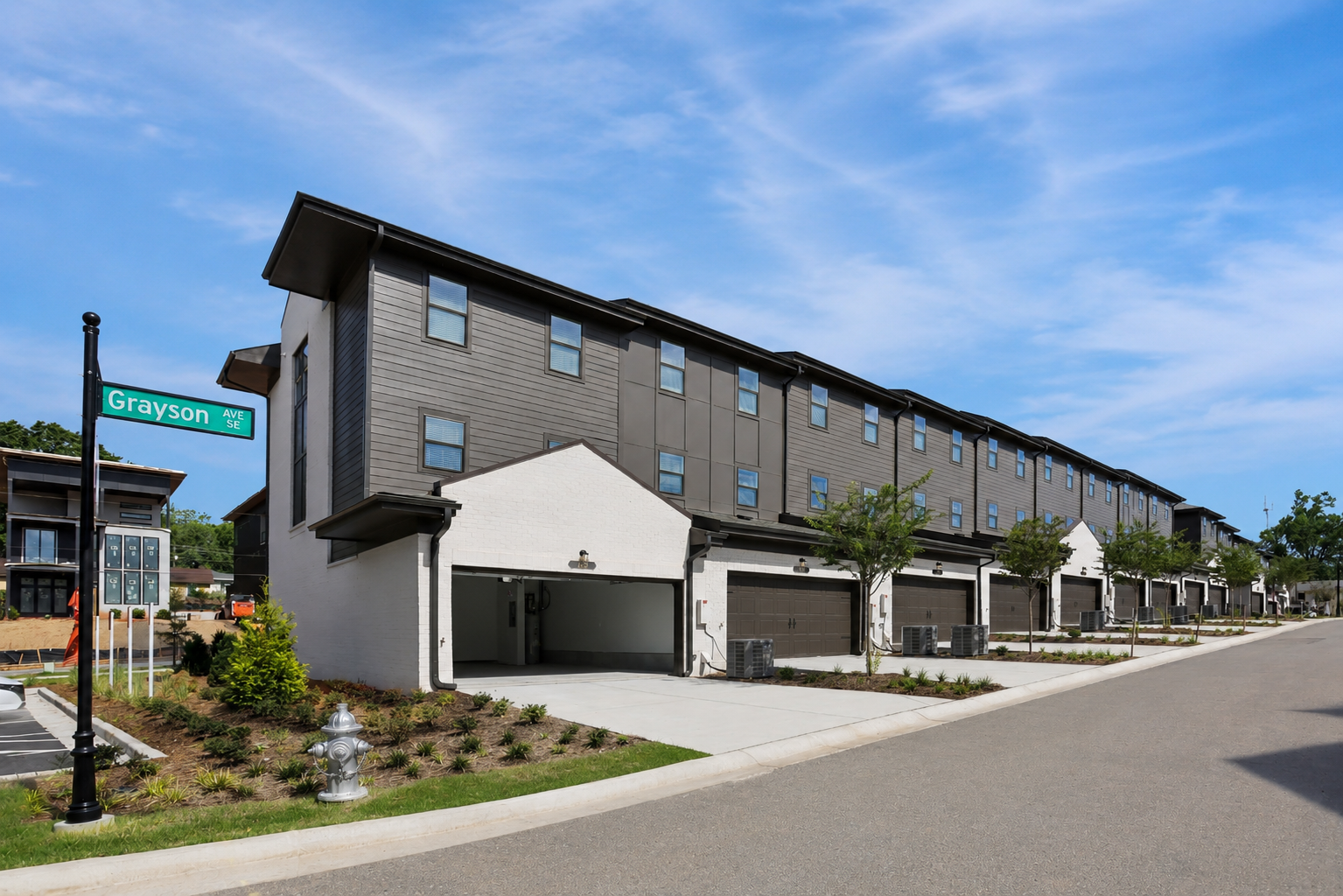 Garage entries at The Garrison townhomes today.