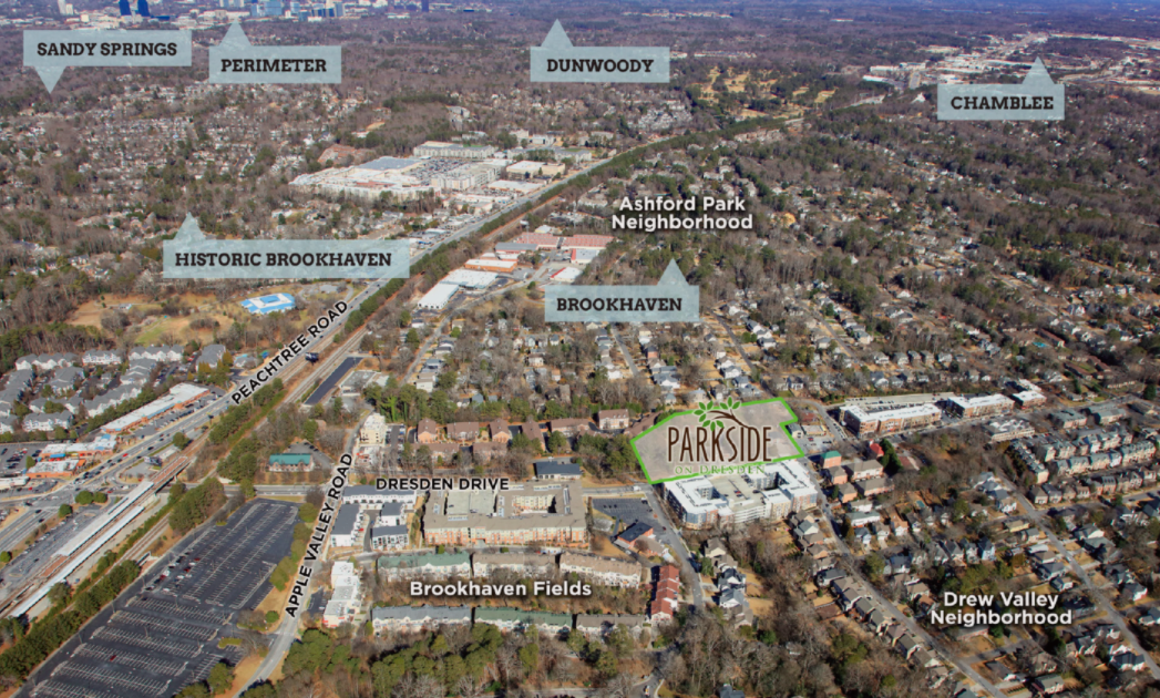 A pedestrian walks through Town Brookhaven, a mixed-use