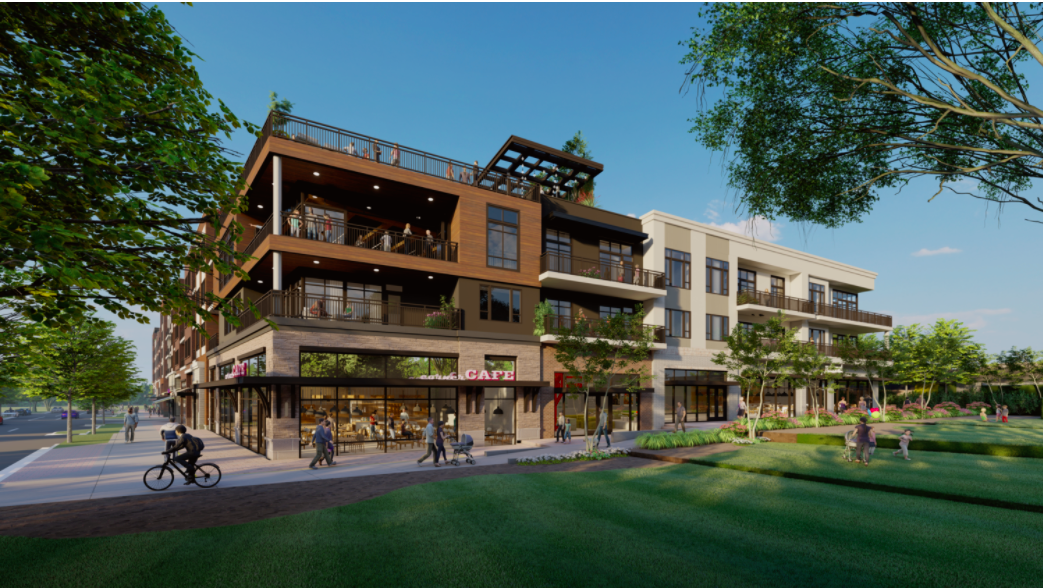 A pedestrian walks through Town Brookhaven, a mixed-use