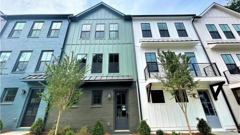 A row of colorful townhomes now for sale in Buckhead Atlanta. 