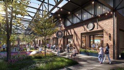 A rendering for a factory redevelopment in Atlanta with people walking near shops. 