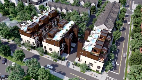 A townhome development along a busy Atlanta street with pools on the roofs. 