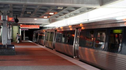 A photo of a MARTA train in Atlanta arriving at a station. 