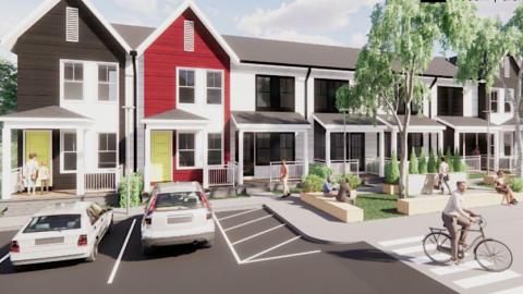A rendering of a brown, red, and white townhome project under blue skies in Atlanta. 