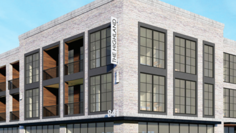 A rendering of a white brick building in Atlanta under blue skies.