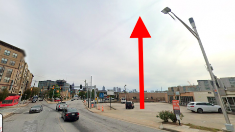 A photo with a red arrow showing where an office development would rise in Atlanta.