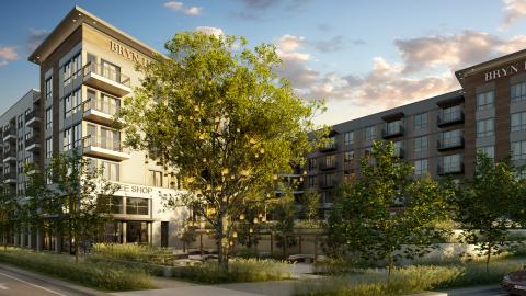 A rendering of a mixed-use building in Atlanta behind a park with trees around. 