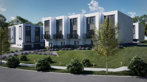 A rendering of white modern townhomes under construction in Atlanta under blue skies. 