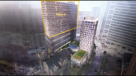 A rendering of two large towers in downtown Atlanta surrounding an old stone church. 