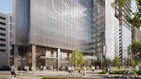 A rendering showing a new office building in downtown Atlanta planned near a greenspace. 