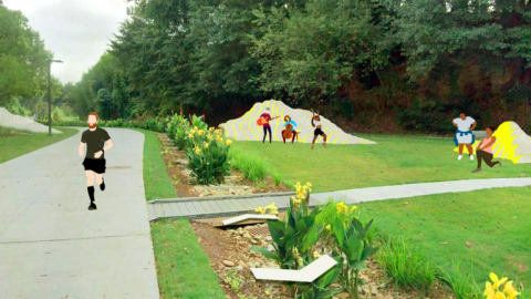 An image of a performance space with rock-like sculptures along the BeltLine in Atlanta. 