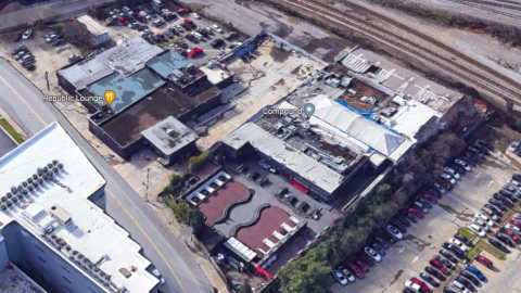 An image of nightclub properties surrounded by wide streets and railroad tracks in Atlanta. 
