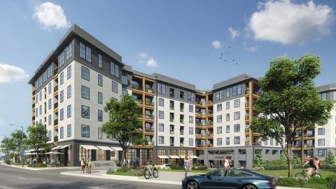 A rendering of a white and gray apartment complex under blue skies in Atlanta. 