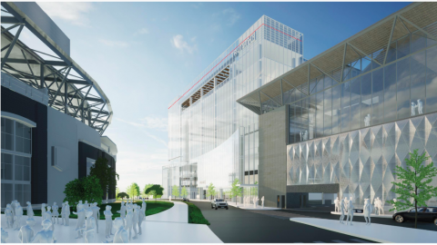 A rendering of a white and glass new office building proposed next to the Atlanta Braves stadium under blue skies. 
