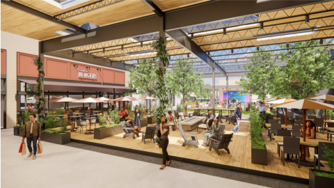 A rendering of an outdoor shopping center turned into a more inviting development with decks and plants. 
