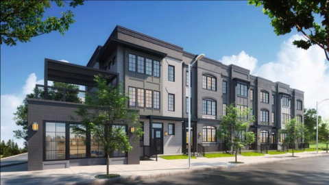 A rendering showing a row of large townhomes under blue skies in Atlanta.  
