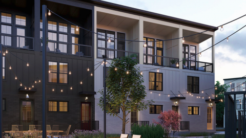 An image of a new modern townhome project under gray skies in Atlanta.