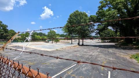 A photo of a large site where a factory was demolished under blue skies in Atlanta. 