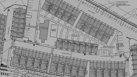 A site plan for 140 townhomes shown in black and white near a freeway in Atlanta. 