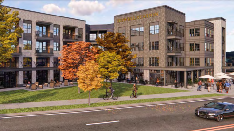 A rendering of a large brick and stucco apartment complex under blue skies, painted brown and white. 