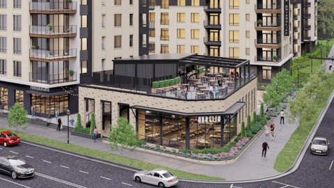A rendering of a white brick and black siding new apartment complex with restaurant space on a corner in Atlanta. 