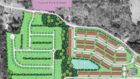 A rendering of a massive subdivision near many trees in green with roads in white. 