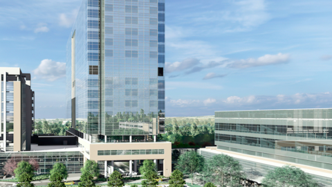 A rendering of a large new glassy tower under blue skies near parking lots in suburban Atlanta. 