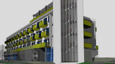 A rendering of a large white and green new dorm building in Atlanta with many balconies.