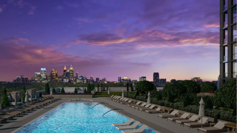 A rendering of a city with a pool in the foreground under purple skies. 