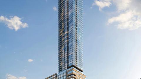 A rendering showing a tall new glassy tower in Atlanta under blue skies with retail at the base.