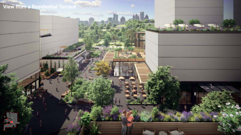 An image showing a large new development with pedestrian pathways and patios and many new buildings beside a large park in Atlanta. 