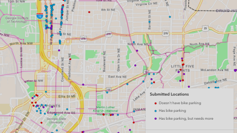 A map showing the city of Atlanta from above with many dots in blue red and purple across the city.