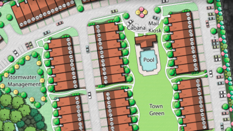 An image showing the location of a large townhome development with red roofs and a town green in the center. 