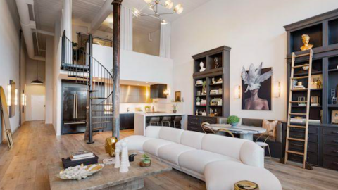 A photo of an Atlanta loft that's huge and gothic and flipped by the Windy City Rehab HGTV team. 