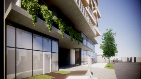 A rendering for a white angular new building next to a wide street under blue skies in Atlanta.