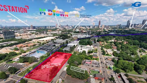 An image of a large industrial site with a brick warehouse next to a wide path for bike and two wide streets. 