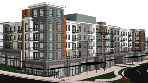 A gray white and orange apartment building shown in a rendering in Atlanta under white skies.