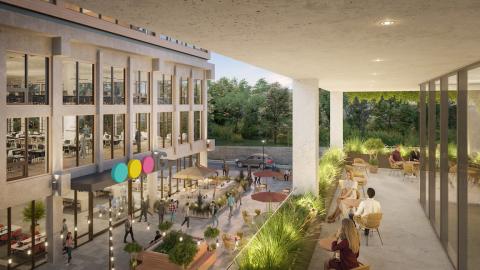 A rendering of a new development with a brick building surrounded by offices with modern interiors and a new hotel under blue skies north of Atlanta. 