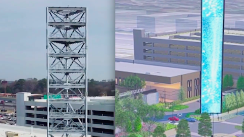 An image showing a giant LED tower built of steel near many studios in north Atlanta, under blue-gray skies.