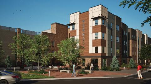 A rendering of a large brick and beige stucco apartment complex under blue skies in Atlanta.