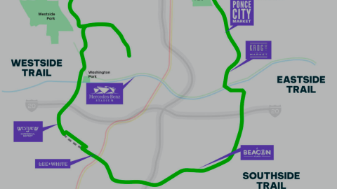 A map of a large green trail running around the city of Atlanta in a U shape. 