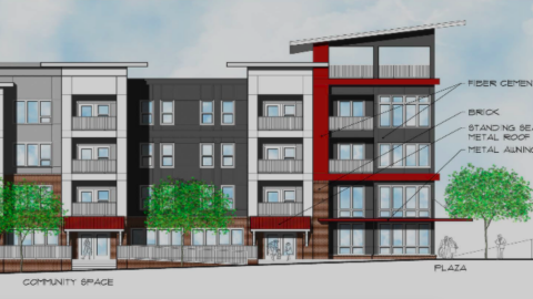 An image showing a development with red and white and stone facades on an empty lot today on Atlanta's southside.