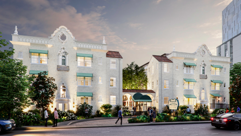 A Spanish style new hotel with a white facade and leafy European style interiors in Midtown Atlanta.