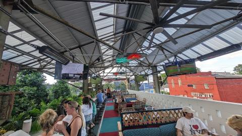 An open air new bar and small restaurant on the roof of a building next to the BeltLine in Atlanta.