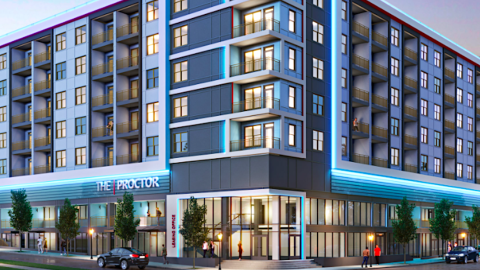 An image showing a development site where a large apartment complex with neon and shops is being built on an Atlanta corner on the westside.