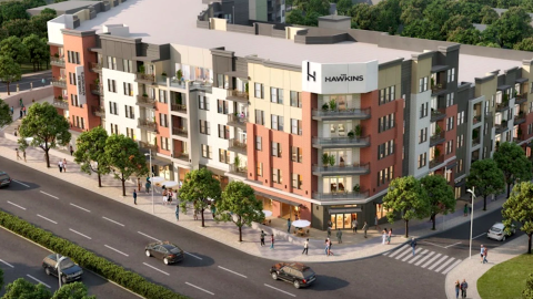 A rendering of a large new mixed-use development named The Hawkins on two wide streets.