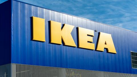 An image showing a new format IKEA store with modern interiors and blue signage.