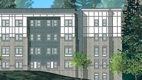 A rendering of a five story building near tall trees and woods with a large parking lot and road next to it, under blue skies.