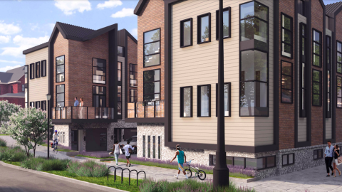 A rendering showing a site for 14 tall new tan and brown townhomes on a corner south of downtown Atlanta with a lane between and a wide street next door.