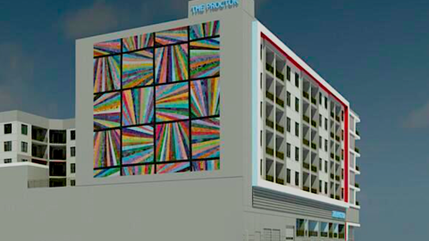 A large gray and white building shown in a rendering with a large mural under dark blue skies.